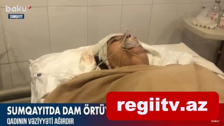 Sumqayıtda dam örtüyü qadının başına düşdü – VİDEO